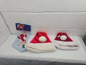 lot 235 image: Christmas Holiday Hat and Stocking Set