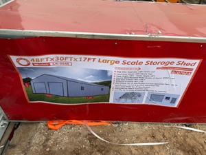 lot 5123 image: Unused CAPTOK 50ft x 31ft x 18ft Large Scale Storage Shed (CK-S5031)