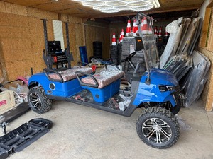lot 5091 image: Unused CAPTOK Off-Road Golf Cart 6 Passenger (CK-GC42S) Vibrant Blue Color - Does have some paint damage on rear fender from Brake Fluid Leak