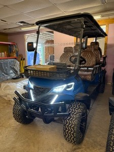 lot 5091 image: Unused CAPTOK Off-Road Golf Cart 6 Passenger (CK-GC42S) Vibrant Blue Color - Does have some paint damage on rear fender from Brake Fluid Leak