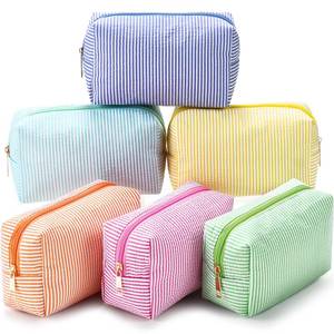 lot 22376 image: Sanwuta 6 Pcs Seersucker Cosmetic Bags Bulk Seersucker Makeup Bags Stripe Women Pouch Large Preppy Storage Pouch Toiletry Travel Organizer for Wedding Bridesmaid Bride Favor Mom Gift (Rainbow) - Retail $28