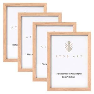 lot 22390 image: ATOBART 5x7 Oak Wood Picture Frames, 4 Pack Natural Wood Color Photo Frame with High Definition Glass for Wall Mount or Table Top Display - Retail $19