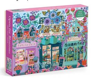 lot 45993 image: Open for Blossoms 1000 Piece Jigsaw Puzzle Featuring Beautiful Artwork of a Storefront Adorned with Blossoming Florals - Retail $20