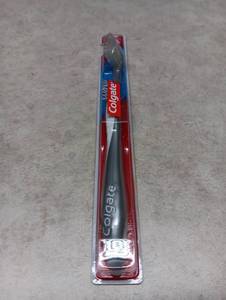 lot 16 image: Colgate Wave Curved Handle Toothbrush