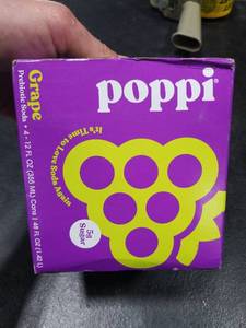 lot 1873 image: Poppi Grape Soda 4 PK BB 1.10.25 - Retail $0
