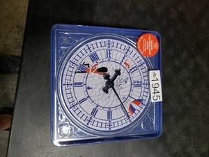 lot 5385 image: M&S Food Orange Flavored Jaffa Cakes in Clock Tin