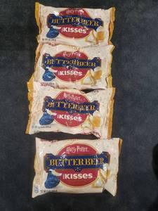 lot 7593 image: 4pk HERSHEYS Butterbeer Kisses Easter Candy with Harry Potter Foils - 9oz