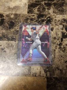 lot 897 image: 2000 Fleer Skybox Mystique Mark McGwire St. Louis Cardinals Baseball Card