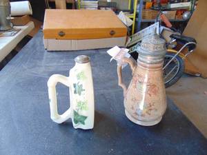 lot 4667 image: Crockware syrup Pourer and Iron Steamer