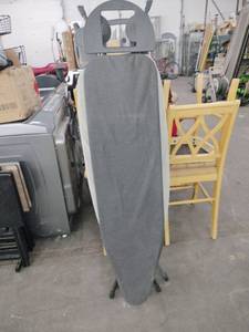 lot 20934 image: Homz T-Leg Foldable Adjustable Ironing Board with a gray cover