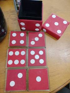 lot 20976 image: set of six red, dice-shaped coasters