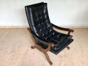 lot 20931 image: 1950s Stansberry tufted black vinyl rocking lounge chair