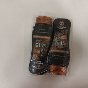 lot 7397 image: Australian Gold Sunscreen Lotion with Instant Bronzer SPF 15, 8 Ounce  Broad Spectrum  Water Resistant  Non-Greasy  SPF 15 8 Fl Oz - TWO PACK