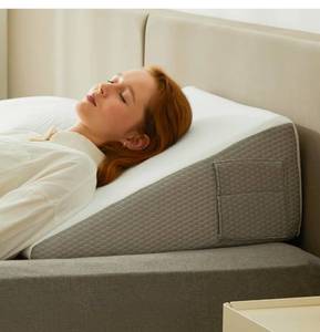 lot 20834 image: Bedluxe Wedge Pillow, 10 inch Bed Wedge Pillow for Headboard, Pillow Wedge for Acid Reflux Relief, Sleeping, Back Pain Relief, Snoring, Triangle Pillow Wedge, WhiteGrey - Retail $0
