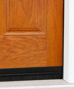 lot 20849 image: 3 FT - Black Door Sweep with Brush for Gaps up to 1  Made in USA - Retail $38