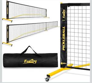 lot 20866 image: Portable Pickleball Net Set with Wheels, Regulation Size 22 FT & Half Court 11 FT, Steady Metal Frame Pickle Ball Net Set System with Carry Bag for Backyards, Driveways, and Garages - Retail $89