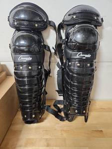 lot 20888 image: Champion Sports Baseball Catcher Leg Guards - Retail $45