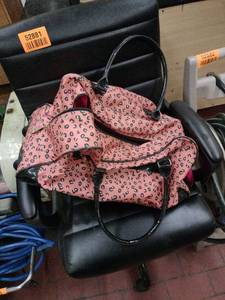 lot 52883 image: Bebe pink leopard print duffle bag