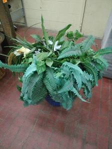 lot 52889 image: Mullally Ceramic Wave Planter with Faux Plant