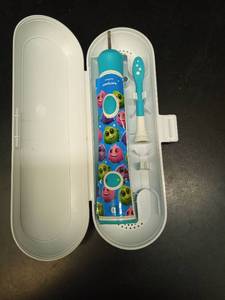 lot 1123 image: Philips Sonicare Kids Electric Toothbrush with Travel Case and Charger - Retail $25