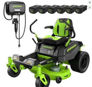 lot 999 image: Zero Turn Riding Mower with 42 Inch Cutting Deck and Accessories - Retail $6,300