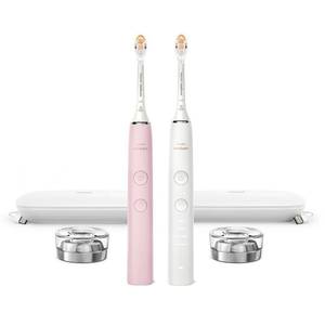 lot 1013 image: Philips Sonicare DiamondClean Connected Electric Toothbrush 2 Pack, x2 Sonic Toothbrushes, x2 Charging Travel Cases, x2 A3 Brush Heads, 12 Brushing Settings, (Pink and White), Model HX991272 - Retail $400