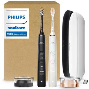 lot 1047 image: Philips Sonicare DiamondClean 9000 Electric Toothbrush - Sonic Toothbrush with App, Pressure Sensor, 12 Brushing Settings, Replacement Reminder, USB Charging Case, Black & Rose Gold, 2-Pack, HX991271 - Retail $400