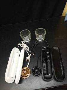 lot 1088 image: Philips Sonicare Electric Toothbrush Set with Travel Case and Accessories - Retail $45