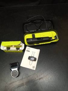 lot 1132 image: Philips Norelco OneBlade Electric Razor Grooming Kit - Retail $25