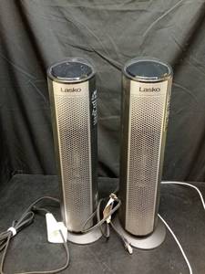 lot 1134 image: Lasko Tower Fan Heater Pair with Oscillation Feature - Retail $50