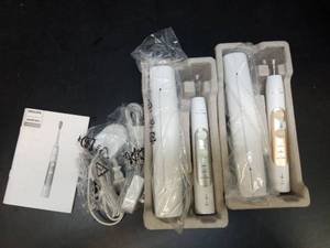 lot 1178 image: Philips Sonicare Electric Toothbrush Set with Multiple Brush Heads and Accessories - Retail $70