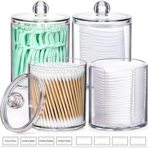 lot 494 image: (ONE LID BROKEN)AOZITA 4 Pcs, Acrylic Qtip Holder Dispenser for Cotton Swab, Ball, Round Pads, Floss Picks - Clear Plastic Apothecary Jar Set for Bathroom Canister Storage Organization, Vanity Makeup Organizer - Retail $8