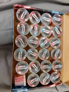 lot 665 image: 24 Pieces Mini Galaxy Slime - Retail $0