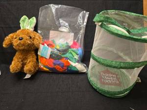 lot 3748 image: Praying Mantis Pavilion Butterfly Kit with Brown Plush Dog