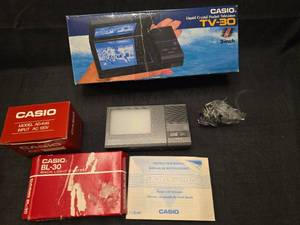 lot 5047 image: Casio TV-30 3-inch Liquid Crystal Pocket Television with BL-30 Back Light System and AC Adapter