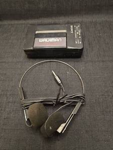 lot 5056 image: Sony Walkman WM-F2015 FMAM Cassette Player with Headphones