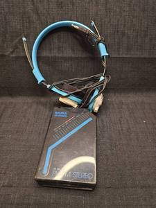 lot 5058 image: MURA Hi-Stepper FMAM Stereo Portable Radio with Headphones