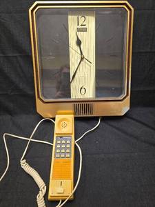 lot 5074 image: Retro Wall Clock with Unisonic Push Button Phone Set