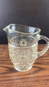 lot 40586 image: Pressed Glass Star Pattern Cream Pitcher with Spout