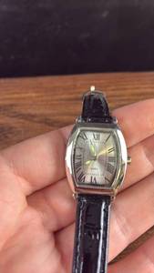 lot 40604 image: Stainless Steel Tonneau Shaped Quartz Watch with Black Leather Strap