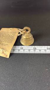 lot 40622 image: Brass Elephant Bell with Original Tag