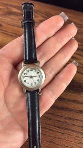 lot 40627 image: Small Analog Wristwatch with Black Leather Strap