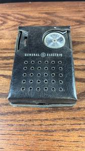 lot 40640 image: General Electric Portable Radio with Leather Case