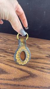 lot 40653 image: Leather Keychain with Gold Ring and Decorative Stitching