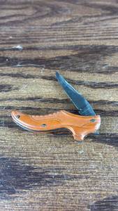 lot 40663 image: Handmade Wooden Folding Pocket Knife with Orange Handle