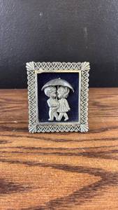 lot 40665 image: Silver-Tone Metal Picture Frame with Children Under Umbrella Relief