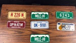 lot 40684 image: Collection of Small License Plates from Various States