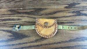 lot 40687 image: Handcrafted Leather pouch with Braided Edges and Adjustable Strap