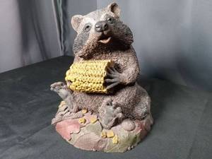 lot 4883 image: Decorative Raccoon Figurine with Corn on the Cob