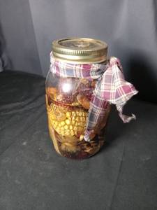 lot 4896 image: Decorative Mason Jar with Natural Elements and Checkered Ribbon